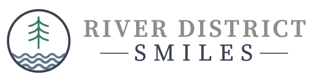 river district smiles logo
